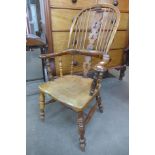 A Victorian elm and yew wood Windsor highback armchair