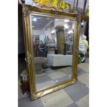 A gilt framed mirror