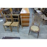 A Victorian Heywood Wakefield wicker bedroom chair, another pair of chairs and a towel rail