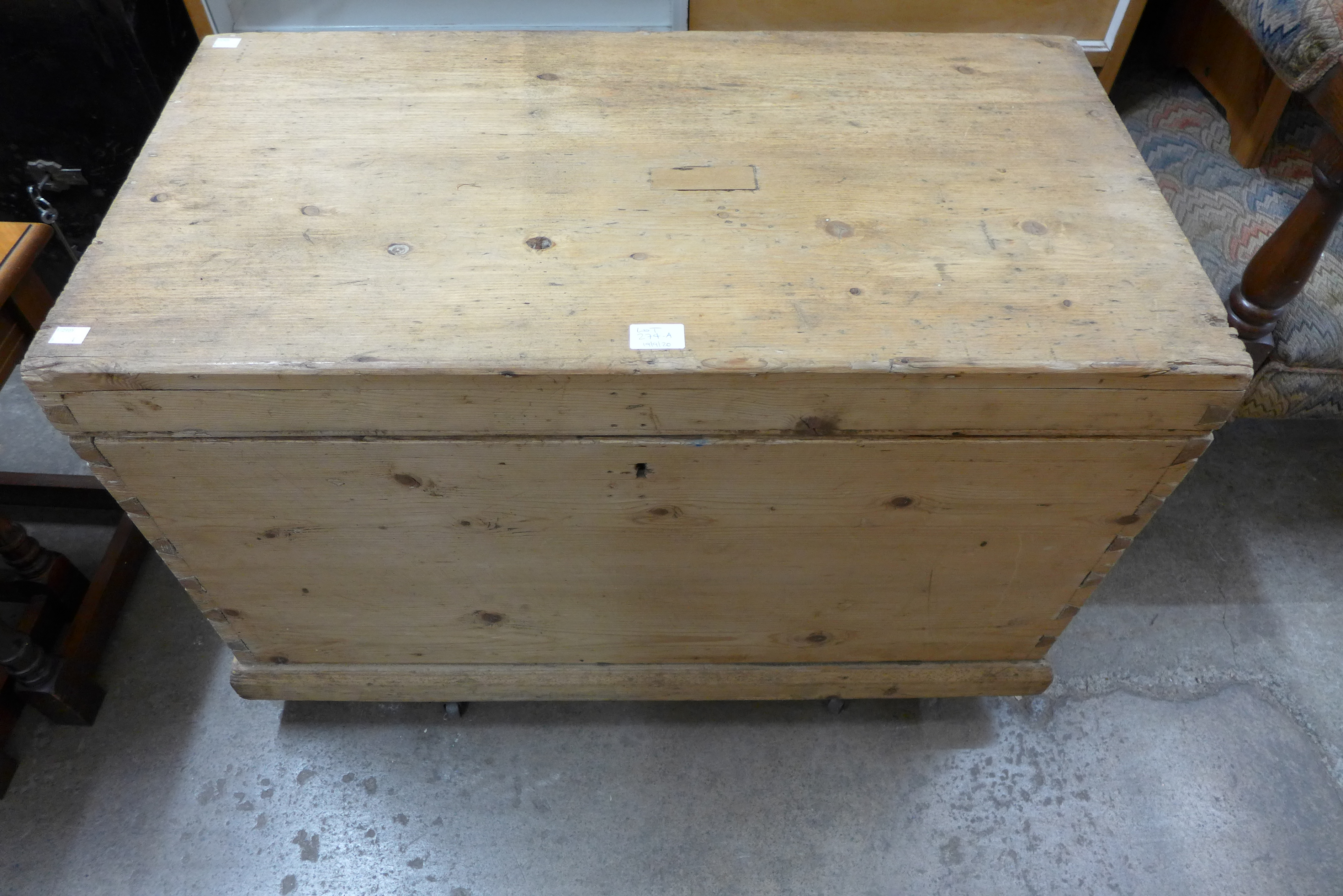 A large carpenter's pine tool chest with tools