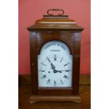 A Thwaites & Reed mahogany double fusee bracket clock