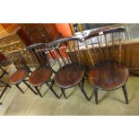 A set of four Victorian beech penny seat kitchen chairs