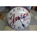 A reproduction Juice Bar quartz wall clock