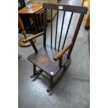 A child's beech rocking chair