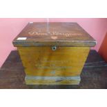 A pine box, bearing Dom Perignon Champagne inscription