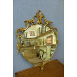 A gilt framed mirror