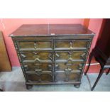 A 17th Century oak geometric moulded chest of drawers