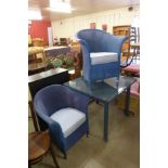 A Lloyd Loom blue wicker table and two chairs