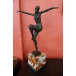 An Art Deco style bronze figure of a female dancer, manner of Demetre Chiparus, on rouge marble