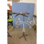 A wrought iron weather vane