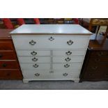 A French style painted oak chest of drawers