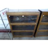 A Globe Wernicke oak three tier sectional stacking bookcase