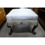 A Victorian rosewood footstool