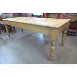 A large Victorian pine farmhouse kitchen table