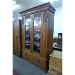 A Victorian satin birch wardrobe (signs of old woodworm to backboards)