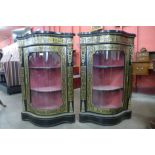 A pair of Boulle style ebonised and brass inlaid serpentine corner cabinets