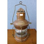 A copper Maritime Anchor ships lantern