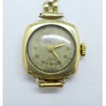 A lady's 9ct gold wristwatch on a 9ct gold bracelet strap, total weight with movement 14.3g, strap