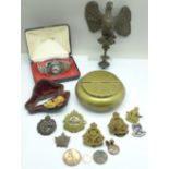An Eagle car mascot, regimental badges, a Timex wristwatch, boxed, carved Meerschaum pipe, a/f, a