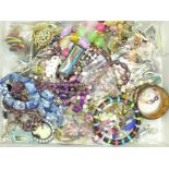 A collection of vintage jewellery and brooches including beaded necklaces