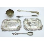 Two silver trays, with import hallmarks, a pair of Victorian silver sugar bows, a strainer and a