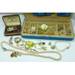 A collection of costume jewellery including a Capodimonte brooch, a 14k rolled gold brooch, and