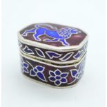 An enamelled silver pill box, marked 925