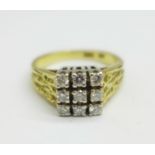 An 18ct gold and nine stone diamond ring, 5.5g, L