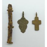 Two Viking bronze crosses and a knife handle, found in Russia