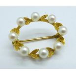 A yellow metal and pearl brooch, 3.4g, (unclear mark, possibly 9ct gold)