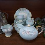 A six setting Aynsley tea service; teapot, six cups, six saucers, six side plates, cake plate, crea