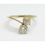 A 9ct gold, two stone crossover ring, 1.7g, M