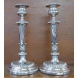 A pair of silver plated candlesticks, height 28cm