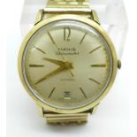 A 9ct gold cased Manis chronometer automatic wristwatch, on a 9ct gold bracelet strap, weight