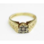 A 9ct gold and diamond ring, 3.6g, O