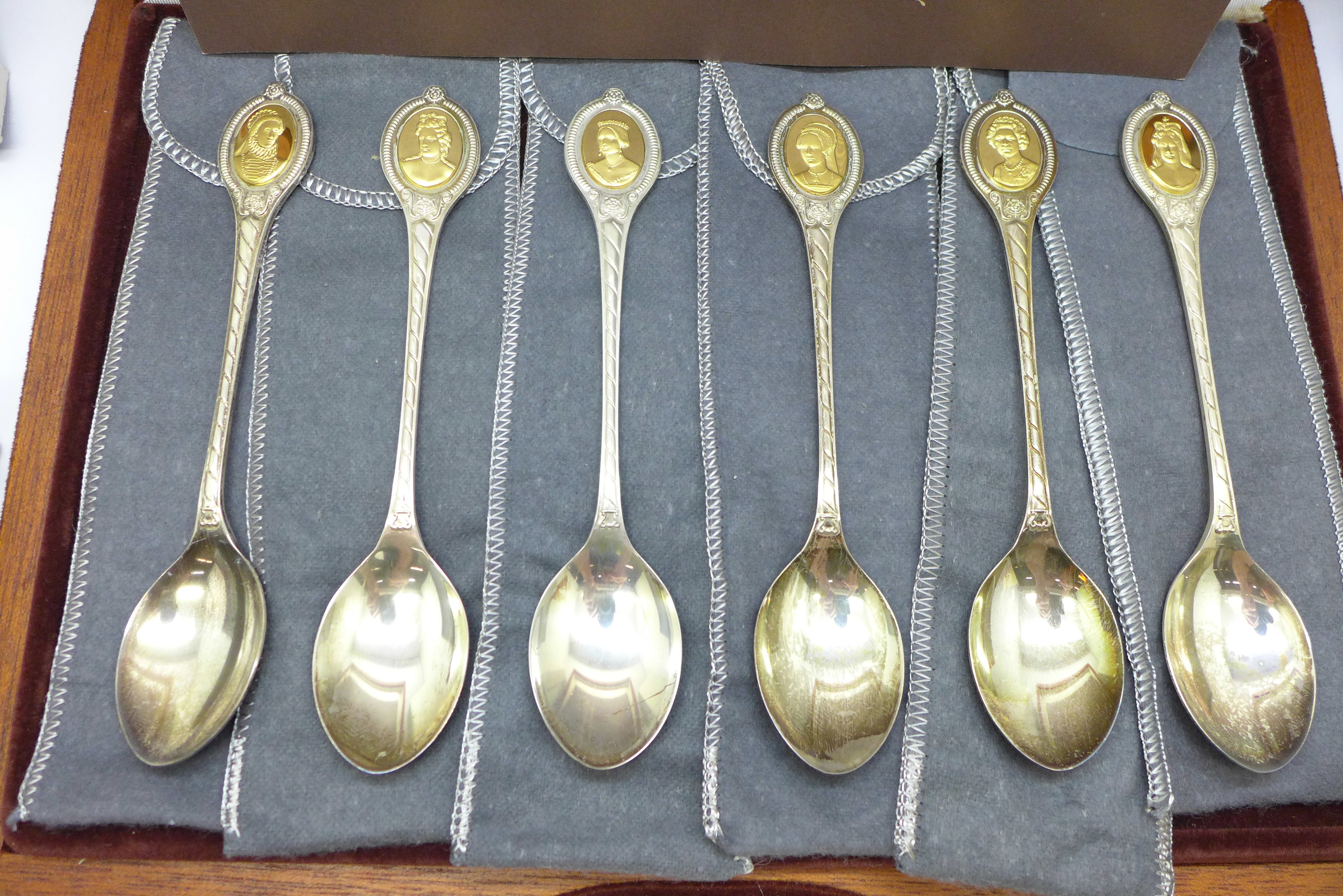 The Sovereign Queens Spoon Collection, cased set of six silver spoons with cameos plated in 24ct - Image 2 of 4