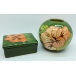A Moorcroft vase, 10cm, and a trinket box, both in the Coral Hibiscus pattern on green ground
