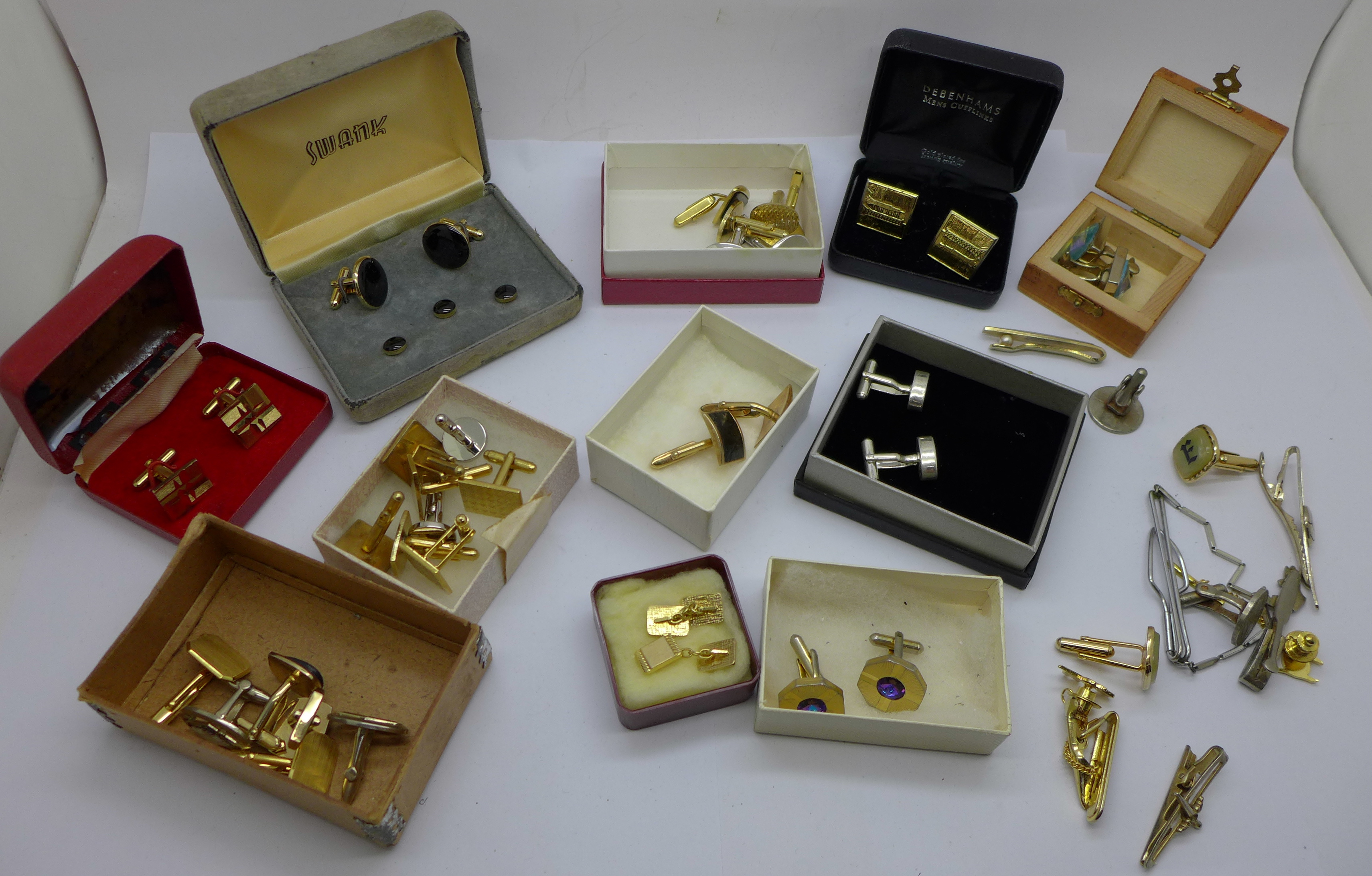 Assorted cufflinks and tie pins