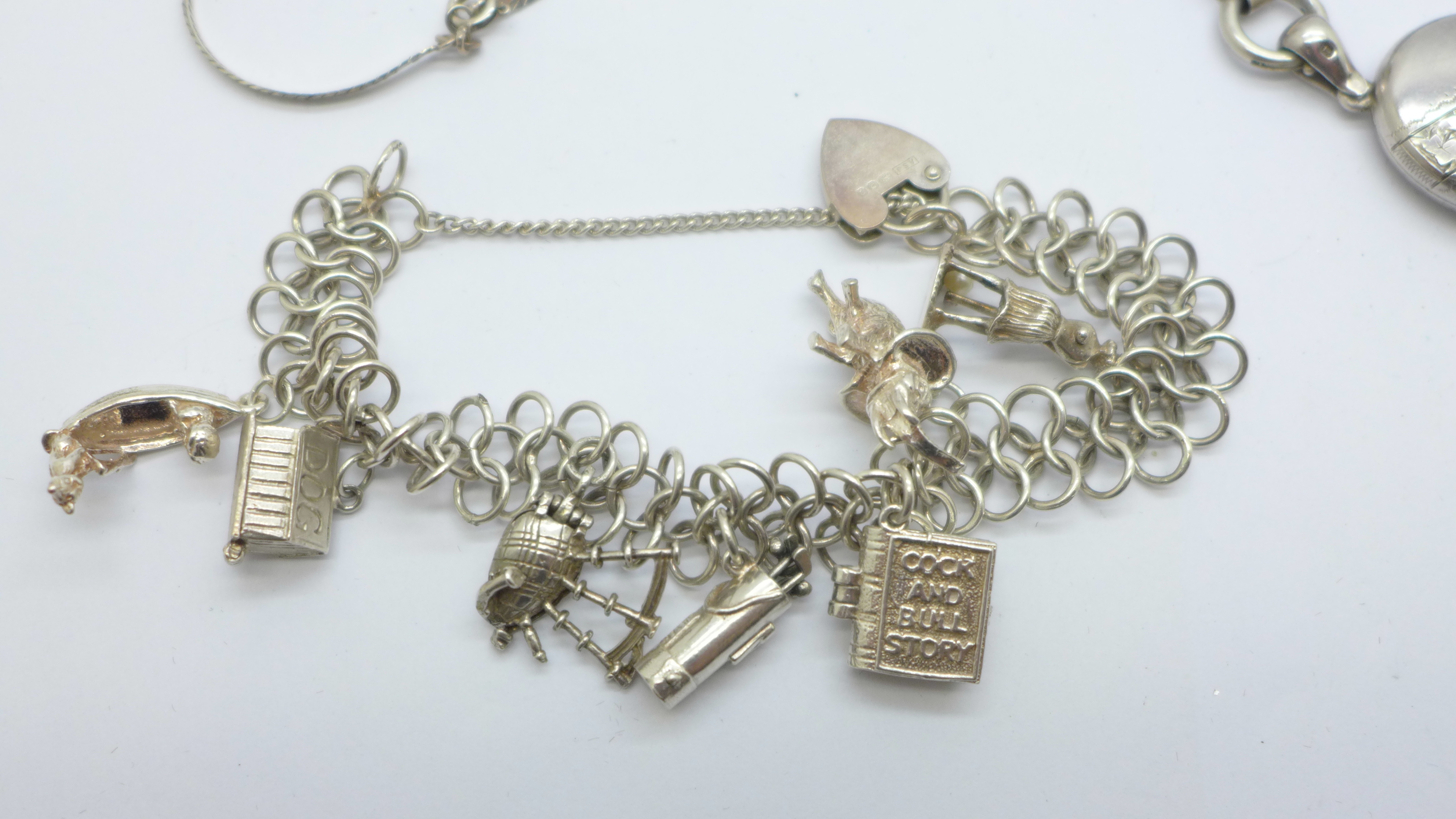 A collection of silver jewellery including a bangle, charm bracelet, locket on chain and marcasite - Image 3 of 4