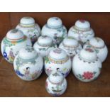 Eleven 20th Century Chinese Republic period ginger jars decorated with famille rose decoration, most