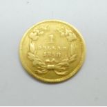 An 1858 United States of America 1 dollar gold coin, 1.6g