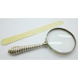A silver magnifying glass, glass a/f and an ivory page turner