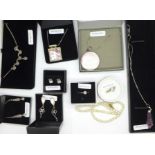 A collection of silver jewellery including mother of pearl, rose quartz and other pink stones