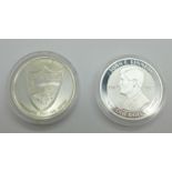 Two 1oz fine silver commemorative coins including a JFK one dollar