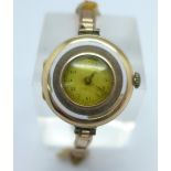 A lady's 9ct gold cased half-hunter style Rolex wristwatch, the movement marked Rolex, the case