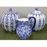 Two blue and white pumpkin shape ginger jars and a blue and white jug