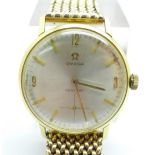 An 18ct gold cased Omega Century wristwatch on a 9ct gold bracelet strap, movement 21614355, total