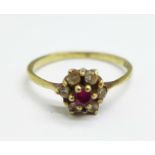A 9ct gold, red and white stone cluster ring, 1.2g, M
