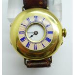 An 18ct gold and enamel half-hunter wristwatch, with monogram and late 19th Century inscription,