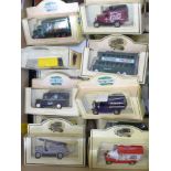 A collection of thirty model vehicles, mostly Lledo promotional/advertising lorries and buses, boxed